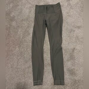 Lululemon Leggings in a deep green.